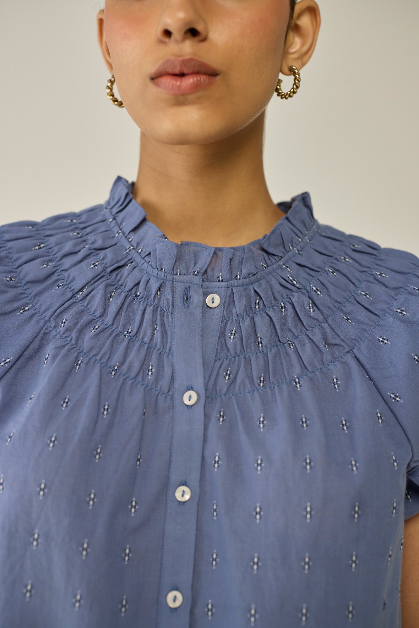 Round neck buttoned blouse