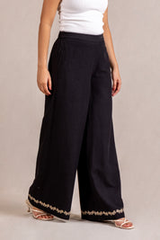 Embroidered black wide-leg trousers