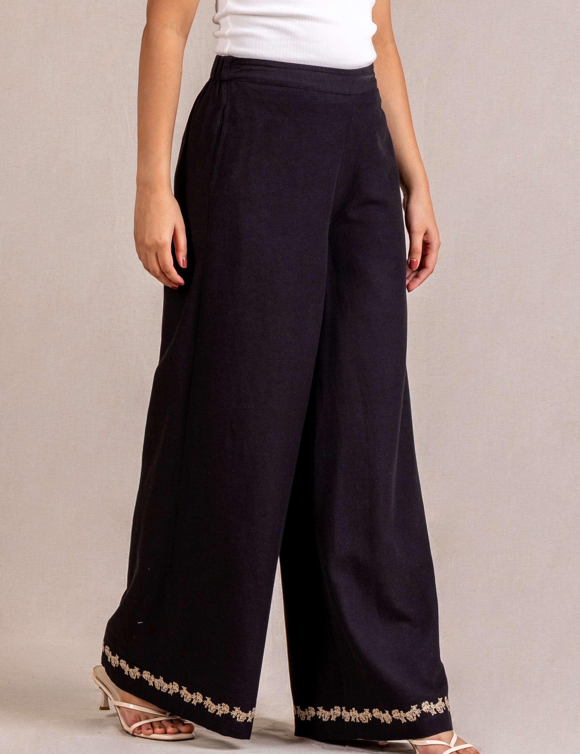 Embroidered black wide-leg trousers