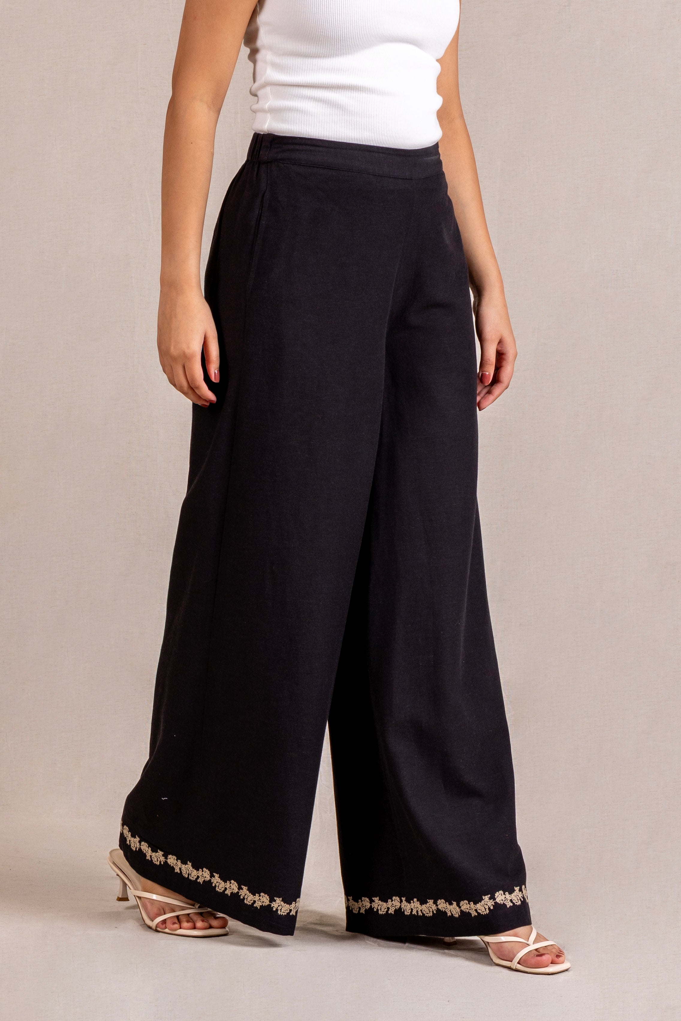 Embroidered black wide-leg trousers
