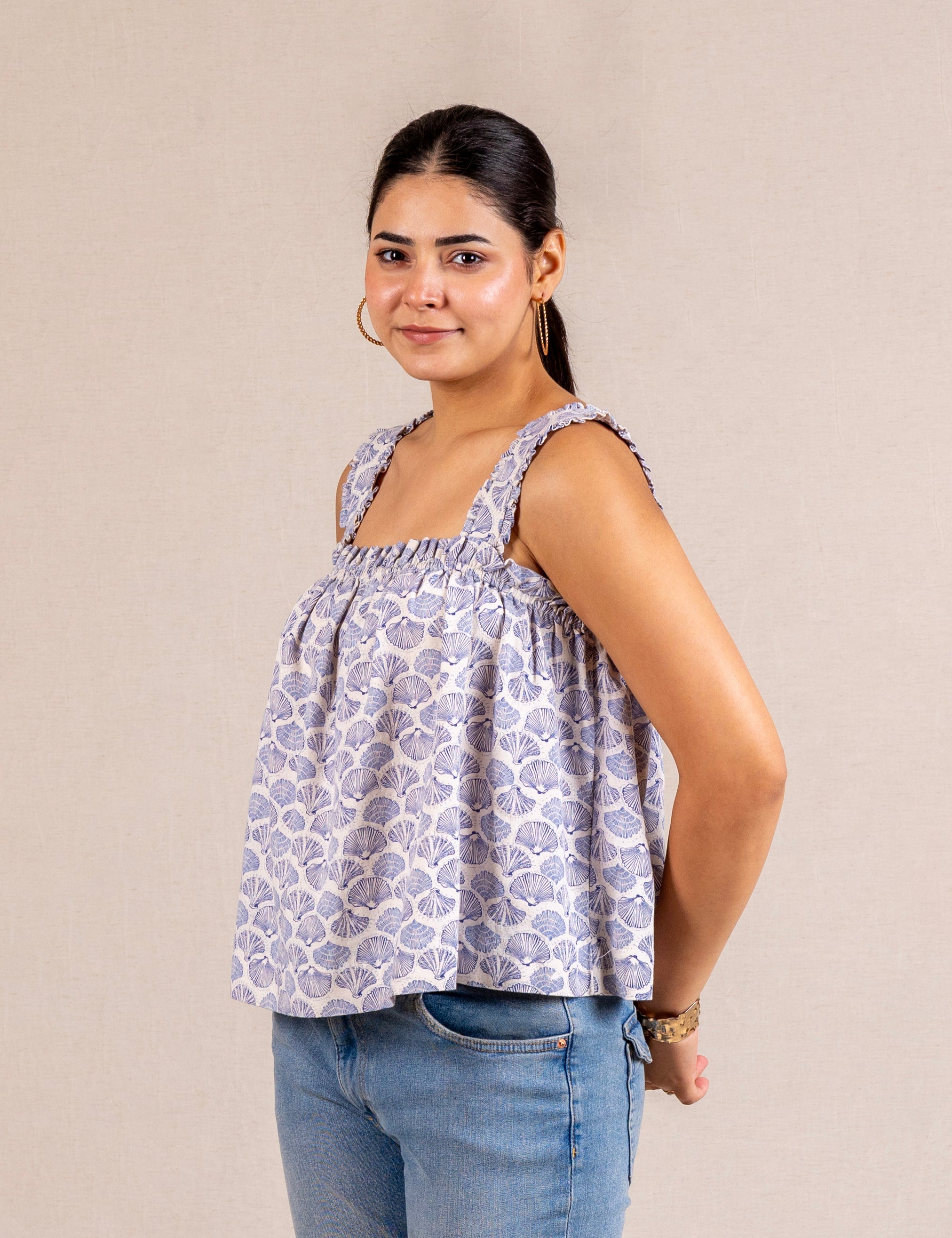 Blue seashell print ruffle top