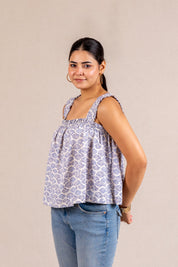 Blue seashell print ruffle top