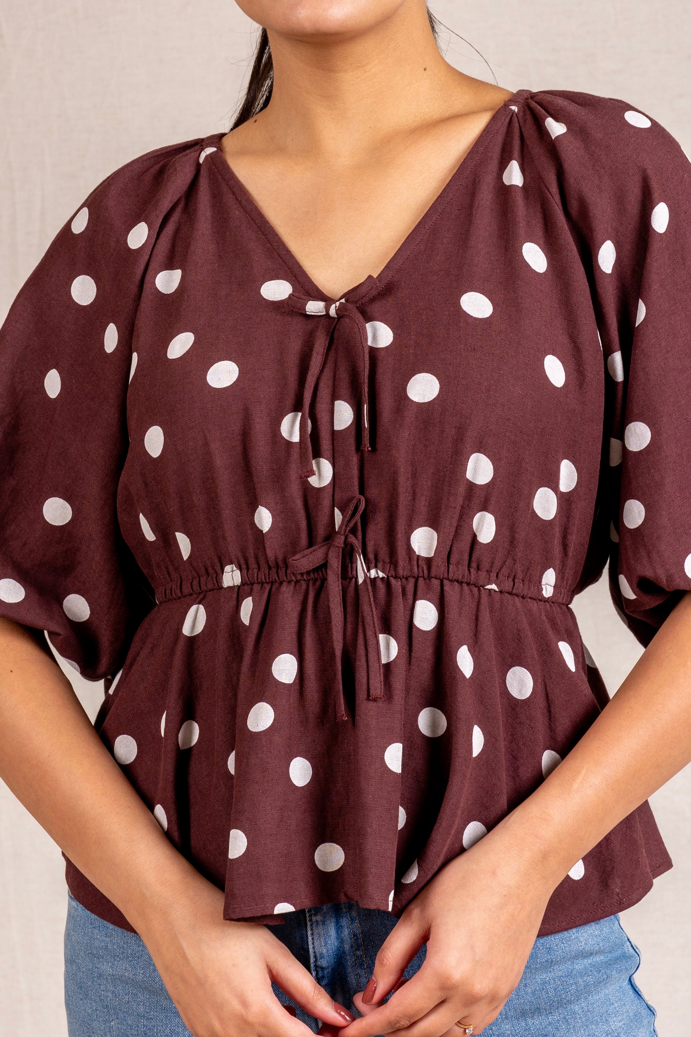 Polka Dot peplum blouse with ties