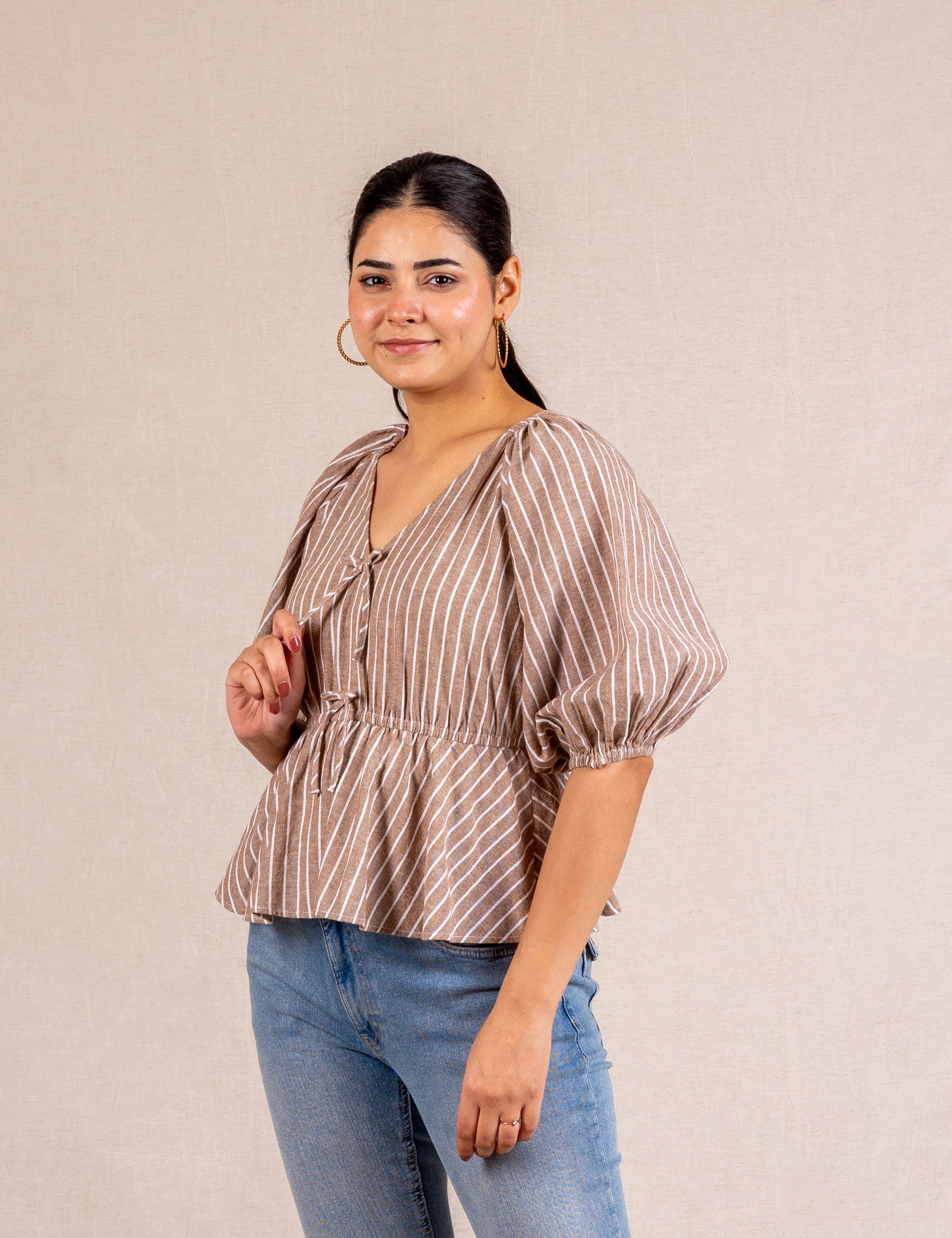 Beige striped peplum blouse with ties