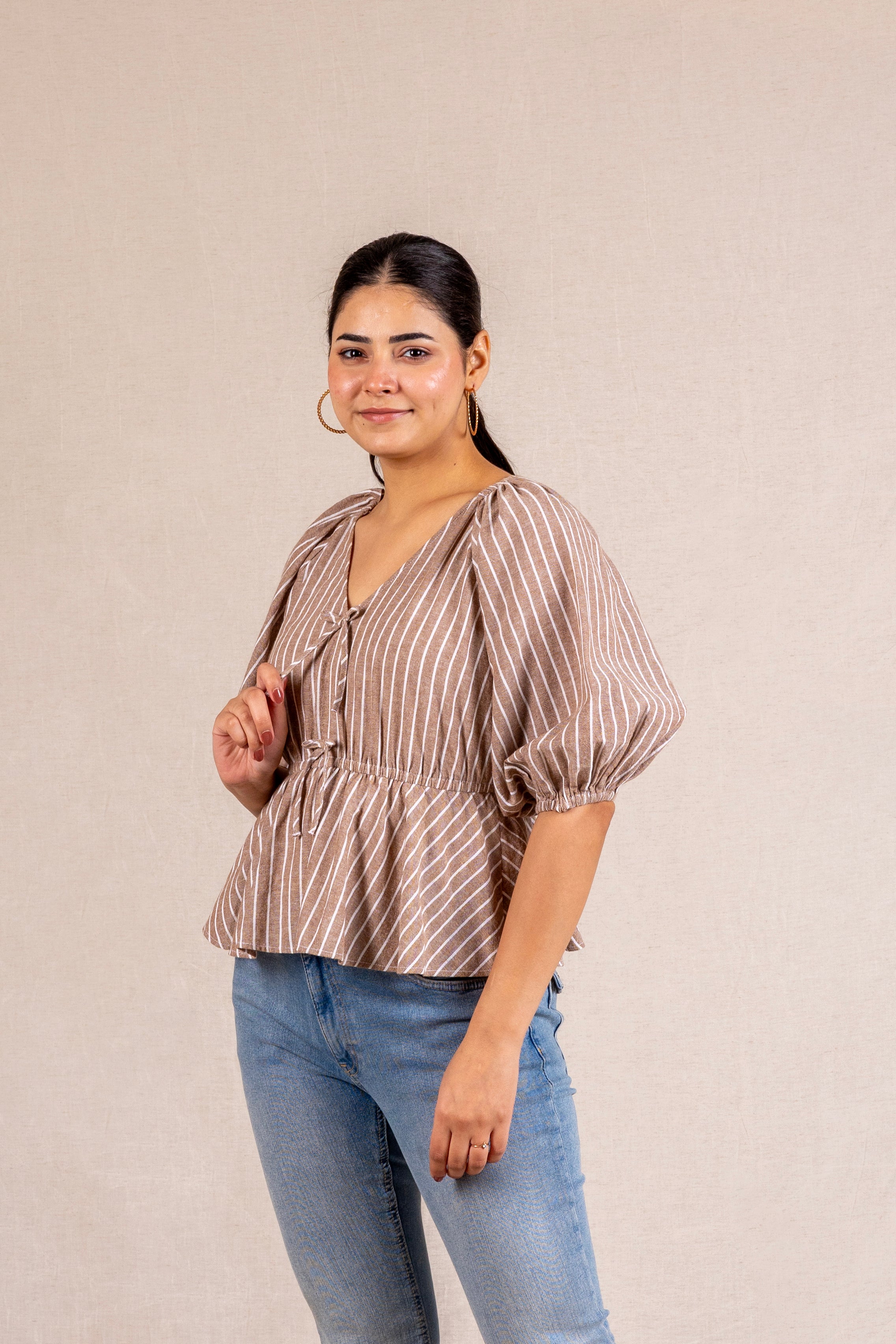 Beige striped peplum blouse with ties
