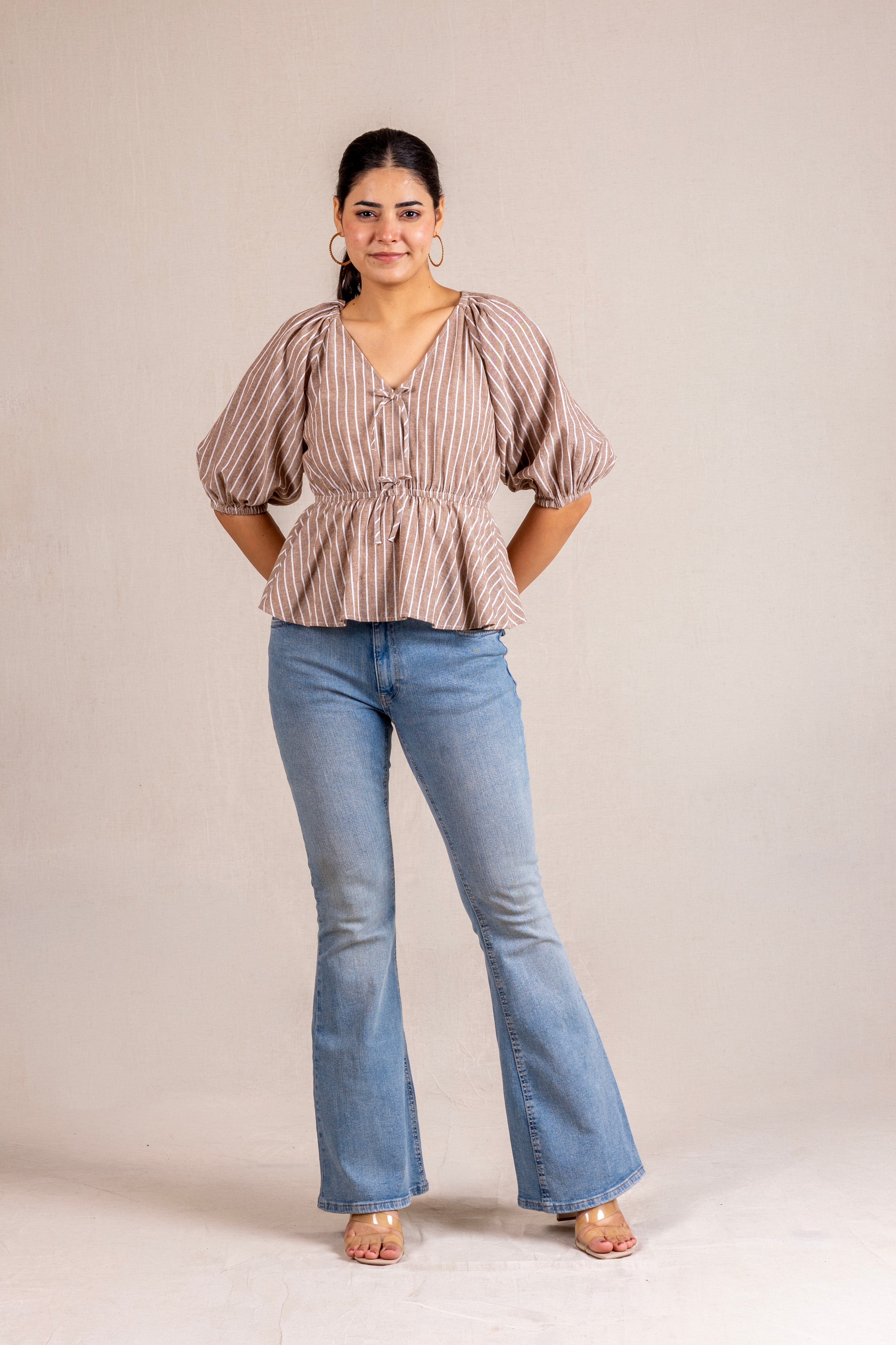 Beige striped peplum blouse with ties
