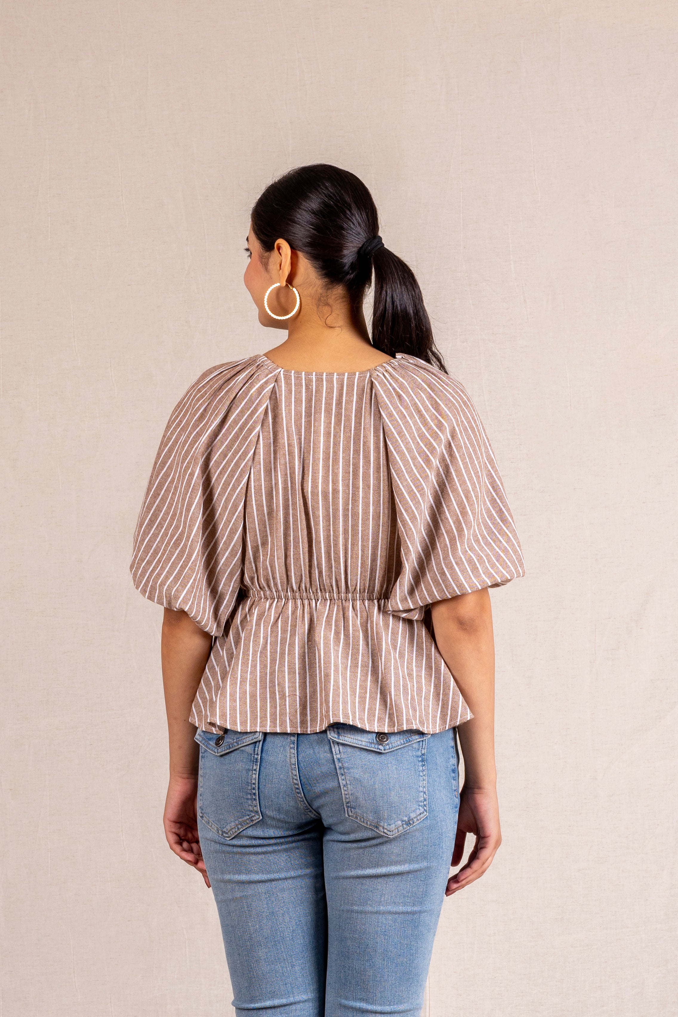 Beige striped peplum blouse with ties