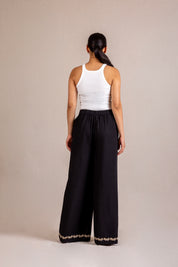 Embroidered black wide-leg trousers
