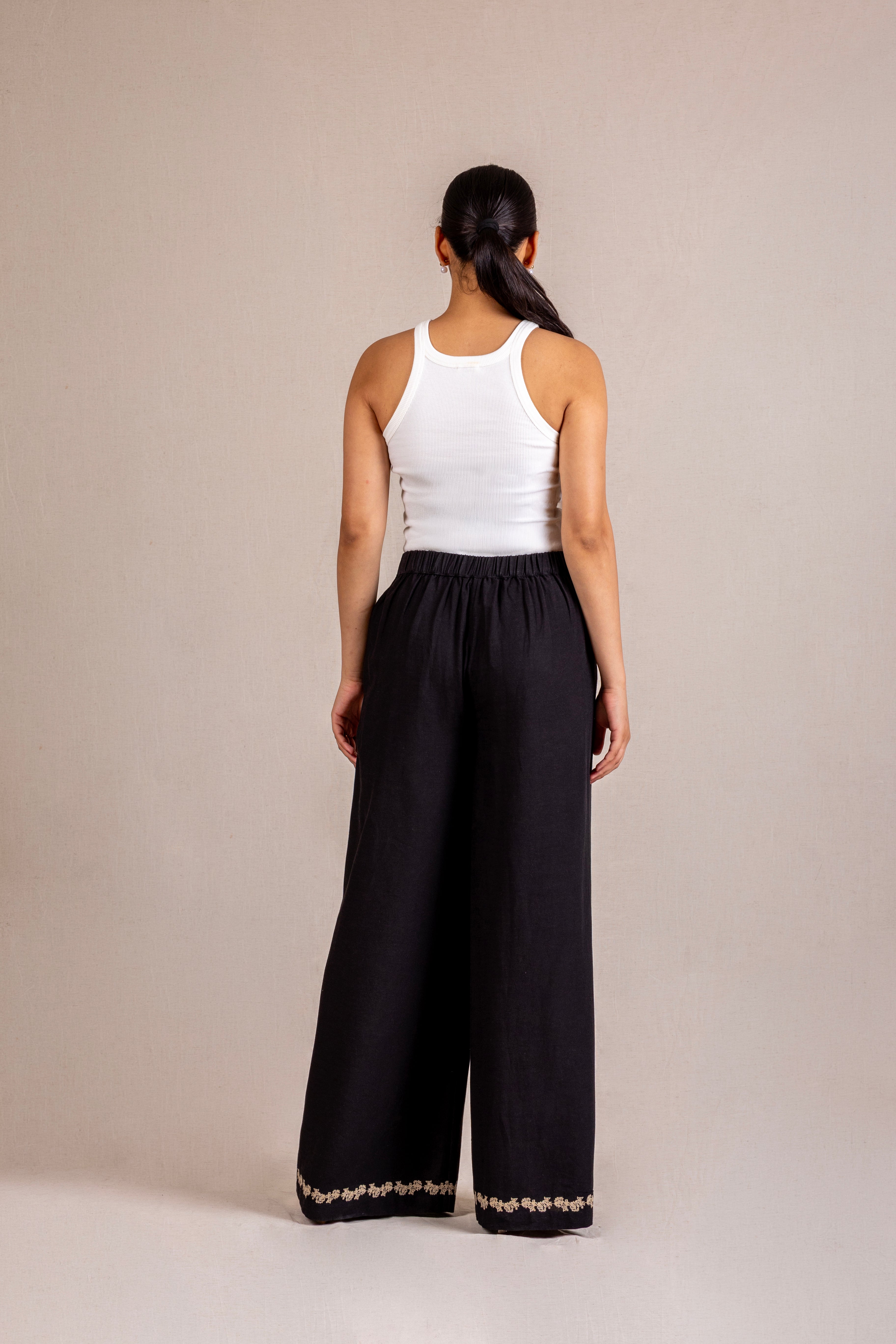 Embroidered black wide-leg trousers