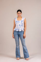 Floral peplum sleeveless top