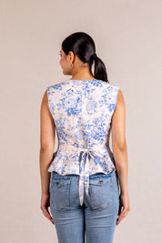 Floral peplum sleeveless top