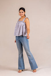 Blue seashell print ruffle top