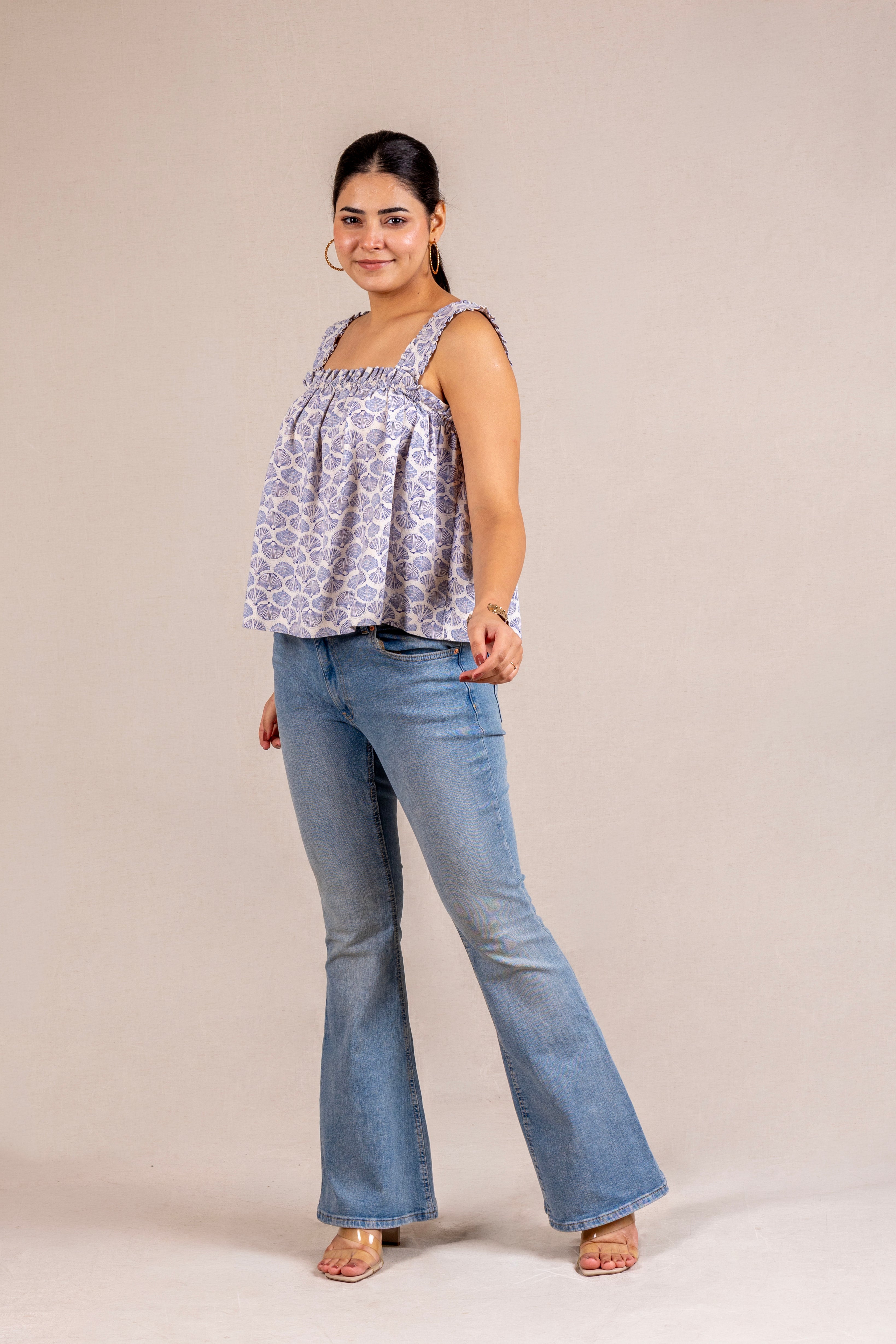 Blue seashell print ruffle top