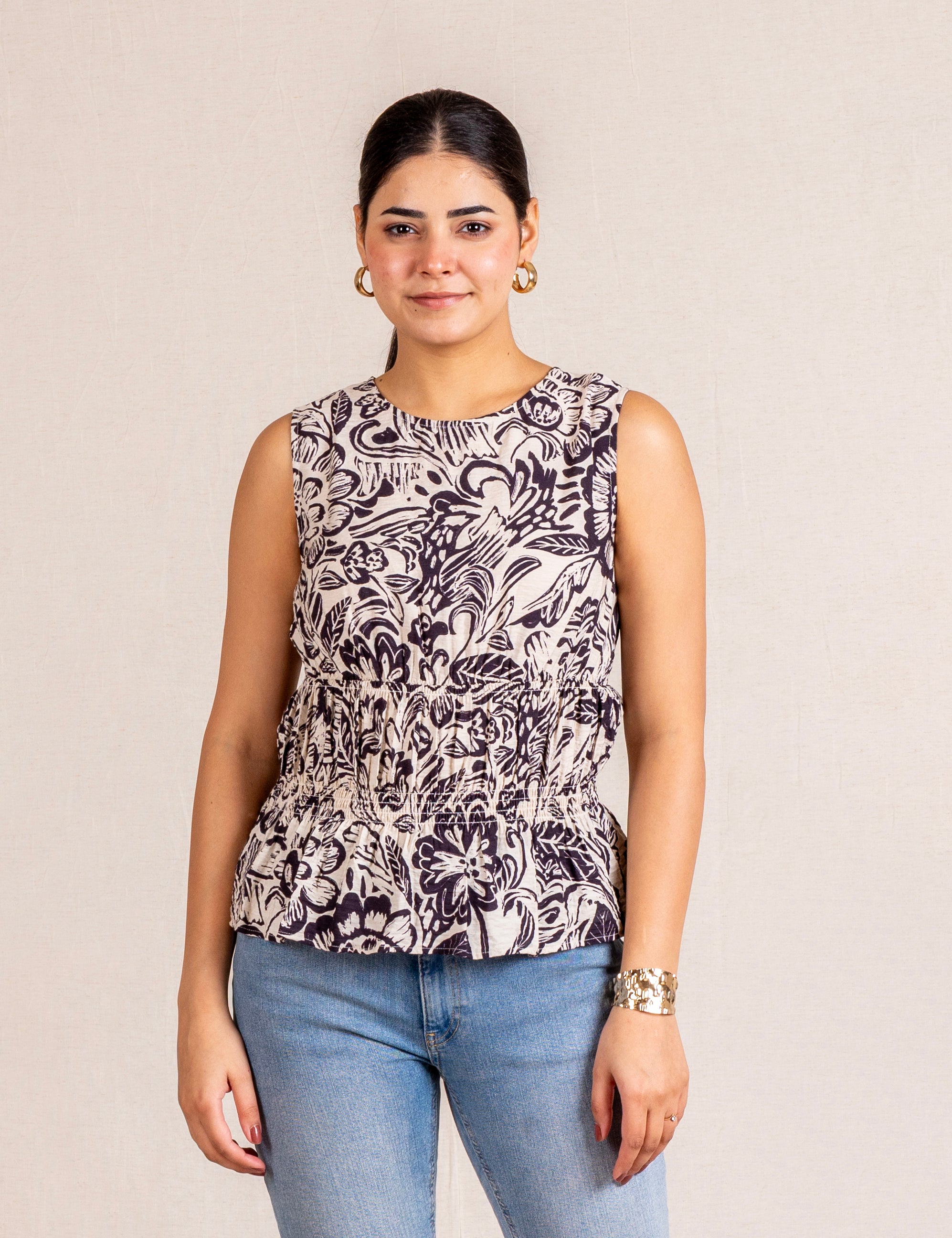 Floral print sleeveless blouse