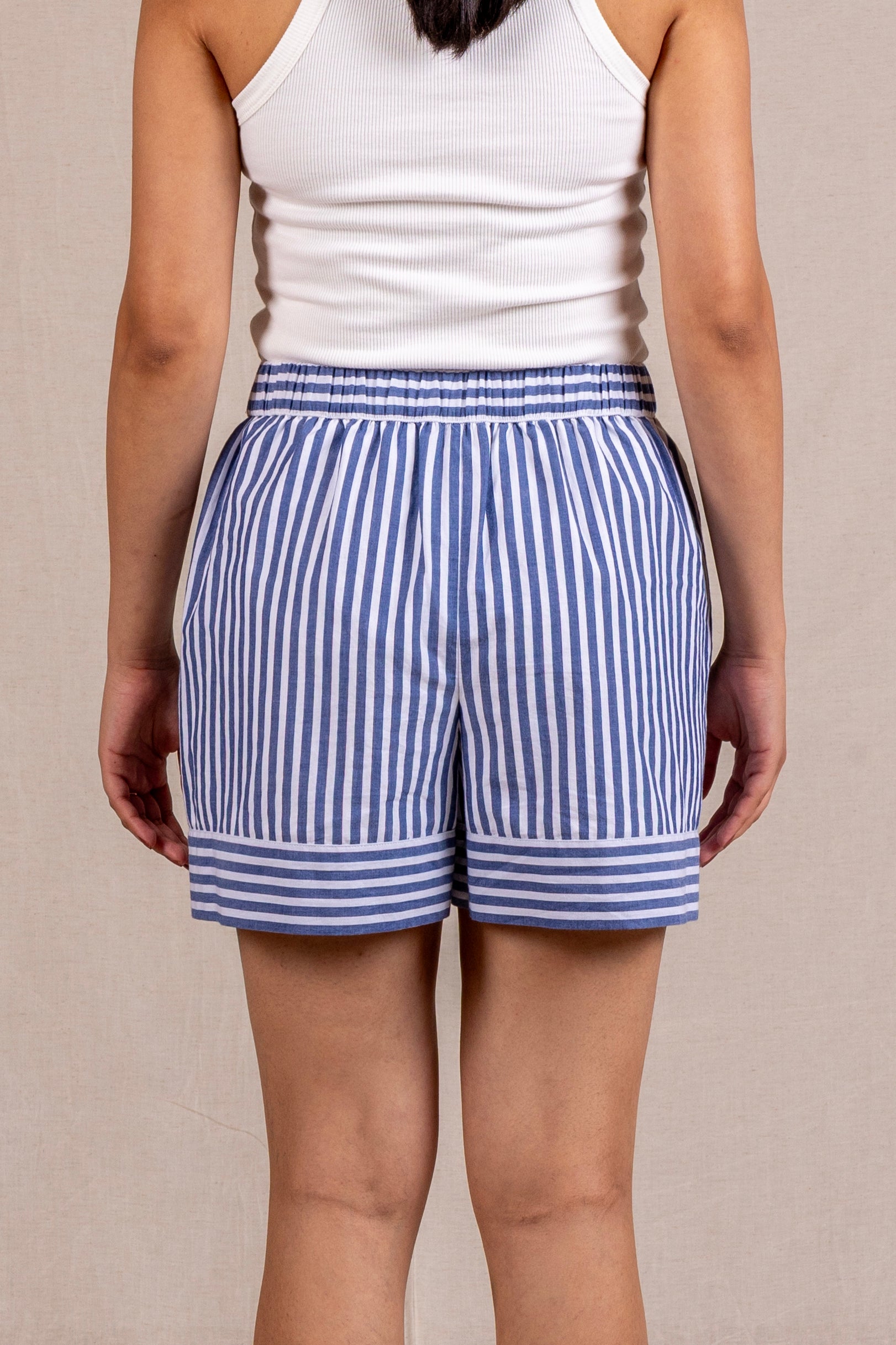 Blue striped shorts with contrast hem