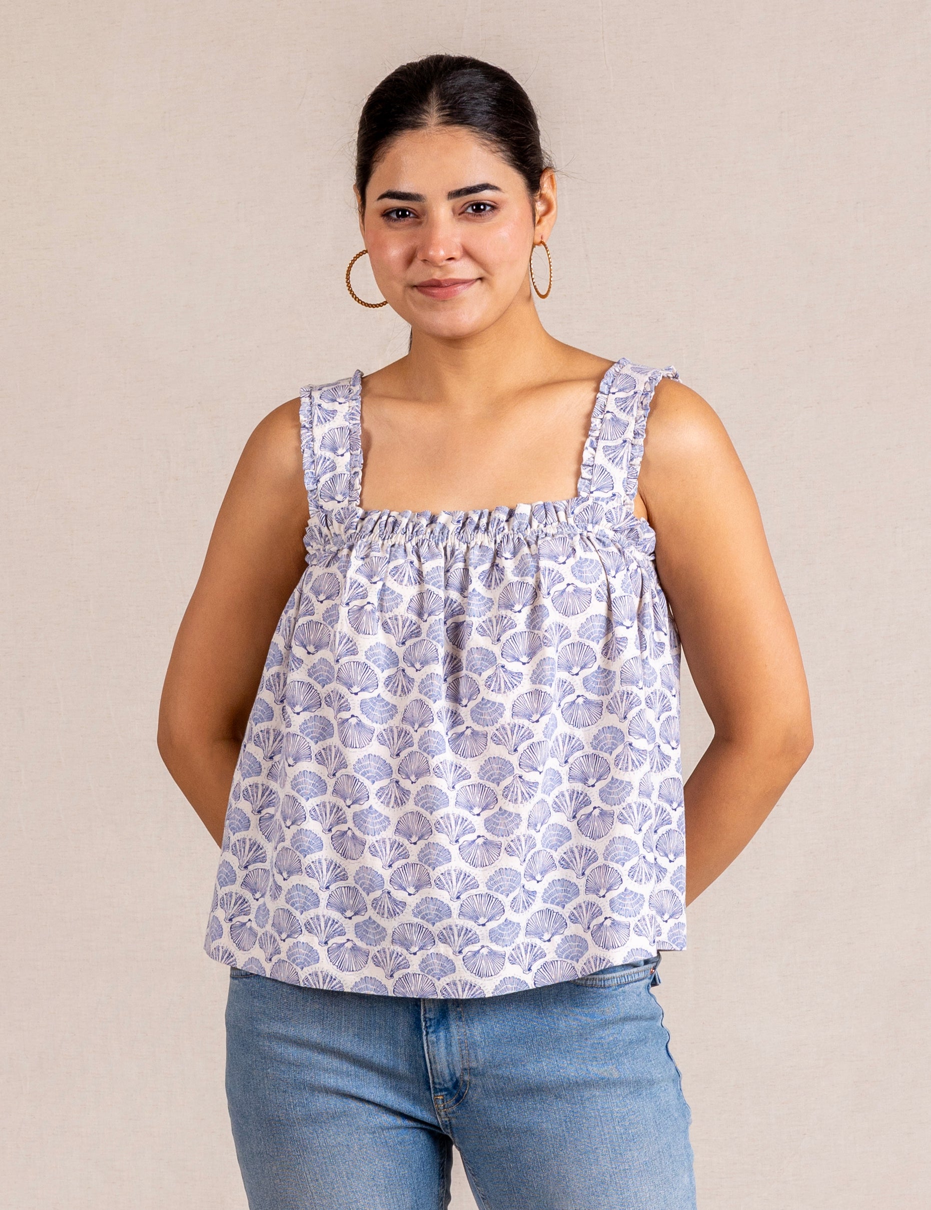 Blue seashell print ruffle top