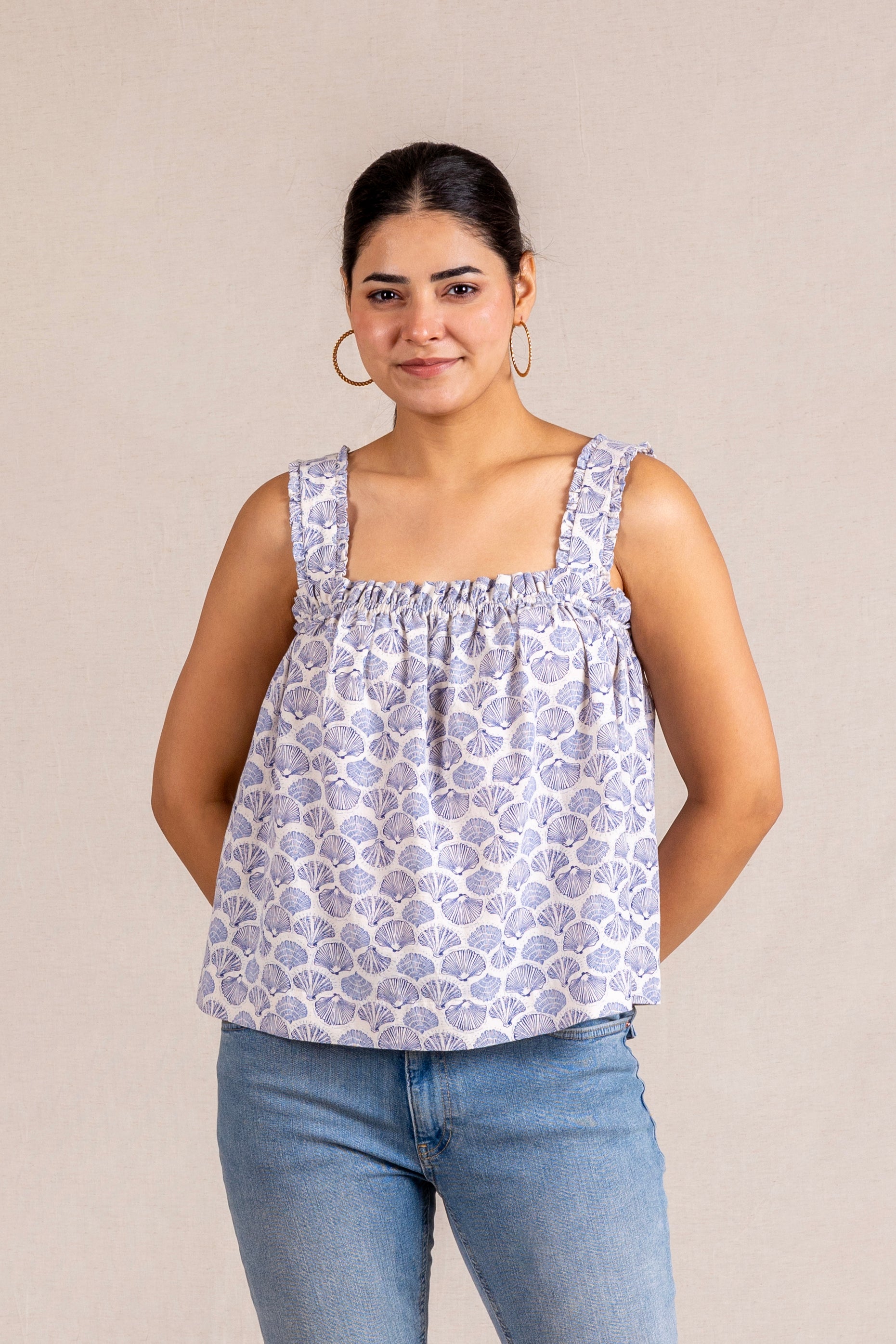 Blue seashell print ruffle top
