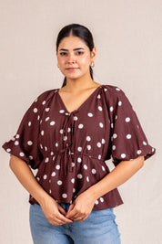 Polka Dot peplum blouse with ties