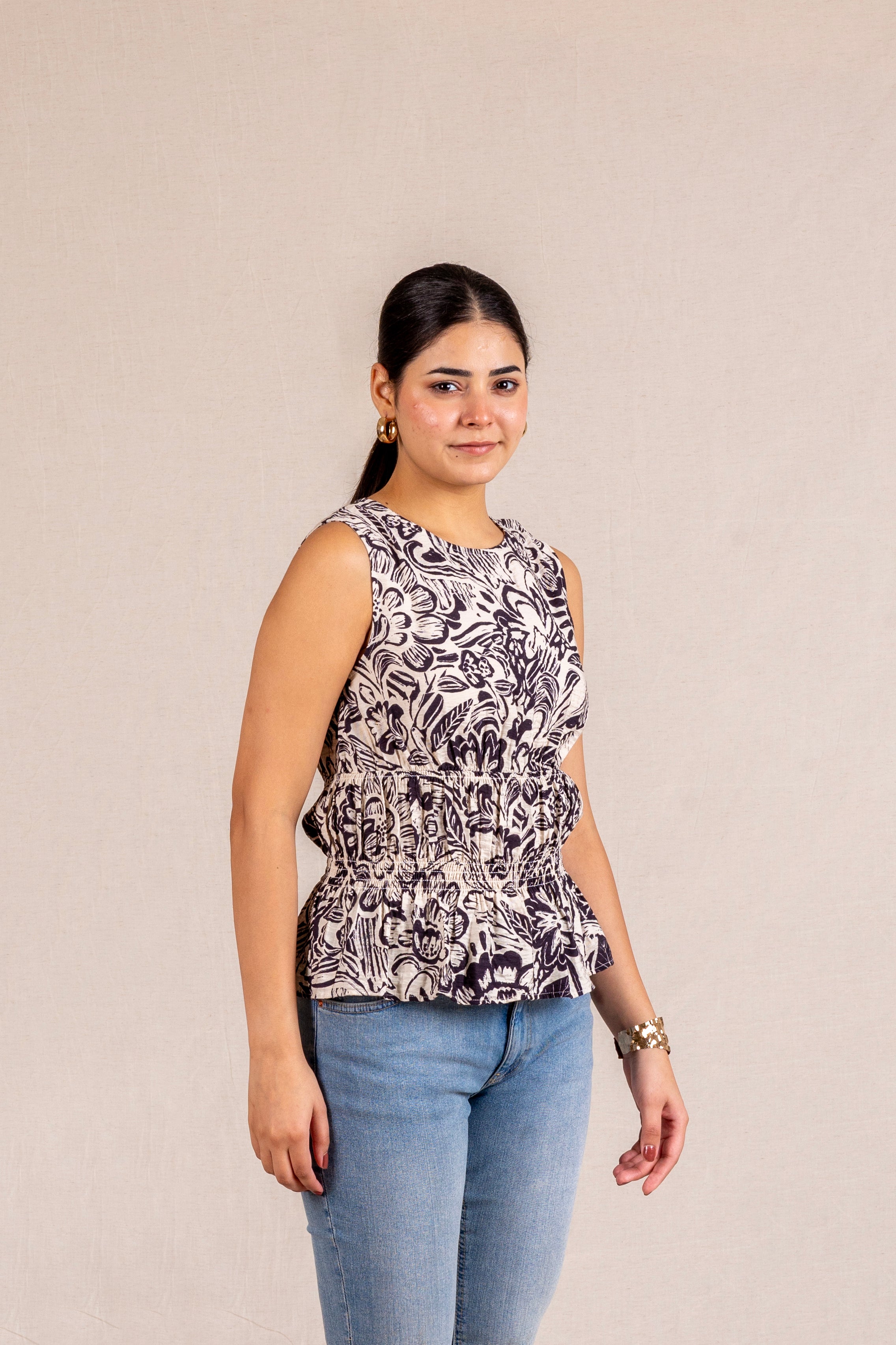 Floral print sleeveless blouse