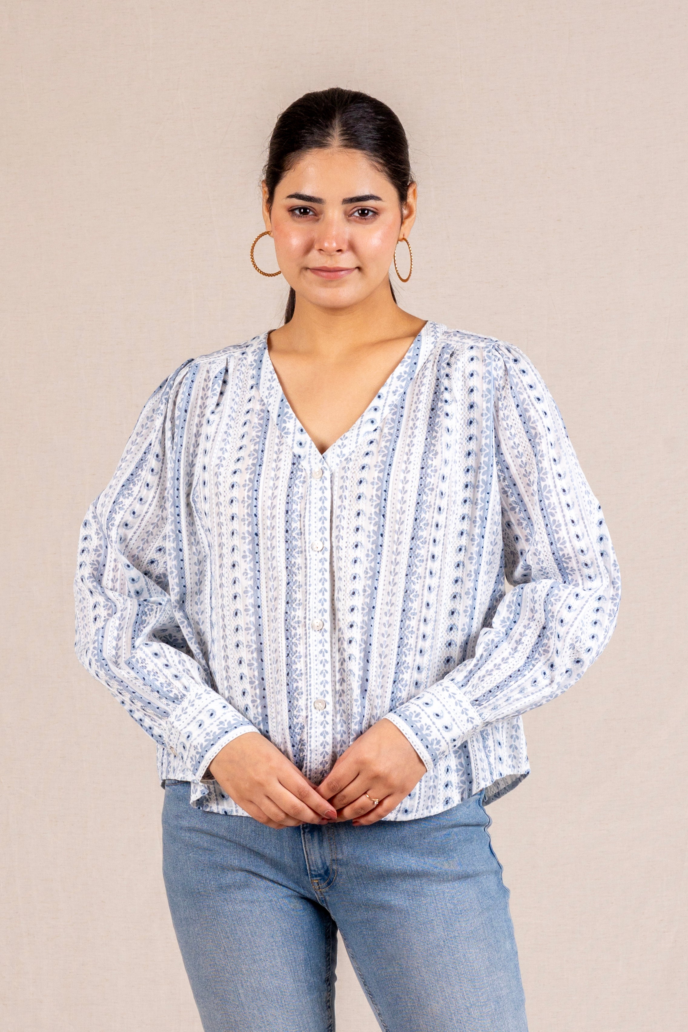 Blue printed V-neck blouse